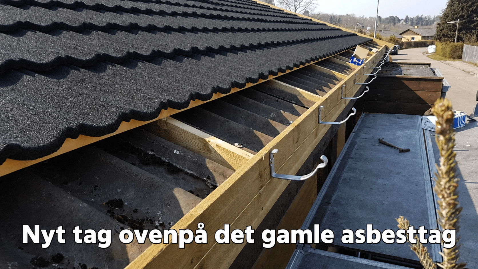 Nyt ståltag ovenpå det gamle asbesttag